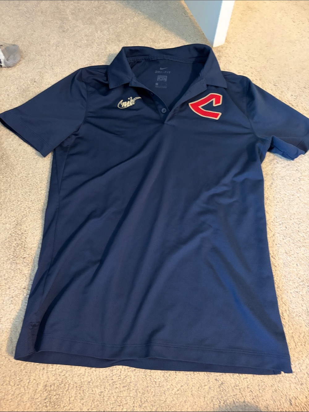 Nike men’s  Navy Polo with Red Patch Detail
